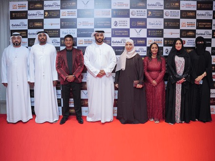 World Beauty Awards winners receiving trophies on stage